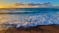 Sea horizon and Ã¢â¬â¹Ã¢â¬â¹wave at sunset hitting the beach